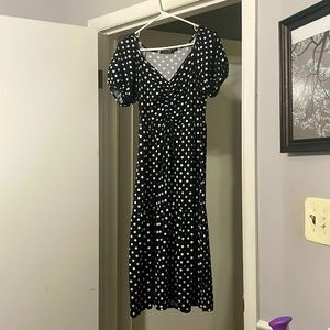 Short sleeve dress worn once or twice black with white polka dots.
